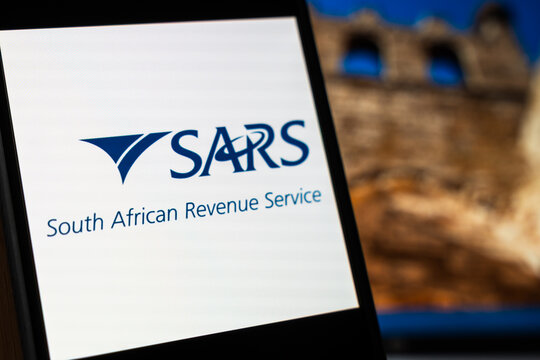 Warsaw, Poland - July 6, 2026: The logo of the South African Revenue Service displayed on a digital screen with a blurred historic background.