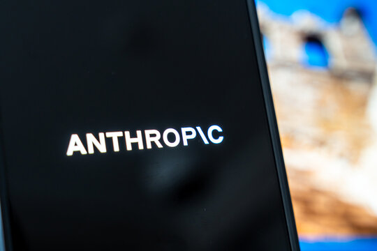 Warsaw, Poland - July 6, 2026: Close-up of smartphone screen displaying the logo of Anthropoc, a technology company, against a blurred background of a stone structure.