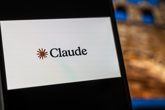 Warsaw, Poland - July 6, 2026: Close-up of a smartphone displaying the Claude logo in a modern digital context, illustrating advancements in technology and artificial intelligence.