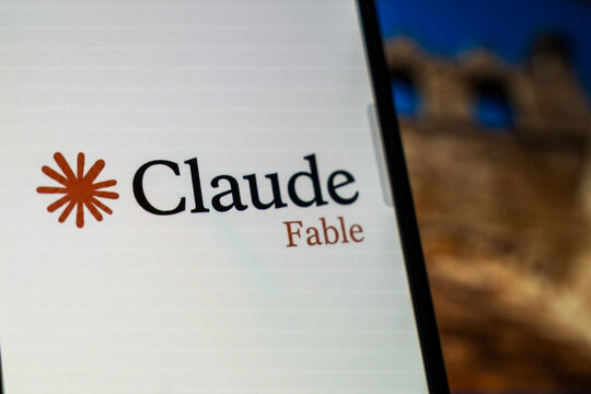 Warsaw, Poland - July 6, 2026: Display of Claude Fable app on a smartphone screen with blurred historic architecture in the background.