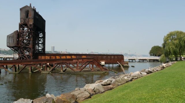 New York City Riverside Park South Manhattan United States. Industrial gantry dock, retro pier in Upper West Side. Hudson river riverfront historic metal vintage crane, old freight port terminal, USA.