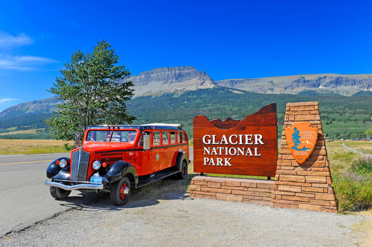 Red jammer  Tourist bus  Glacier National Park Montana MT US. 07.06.26