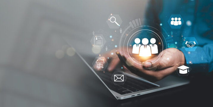 Business professional using digital HR recruitment interface with talent acquisition, candidate search, employee engagement, workforce management, hiring strategy, and human resources technology.