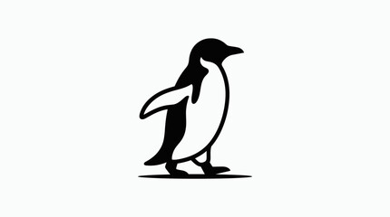 A penguin standing on land with one flipper raised sideways © rian