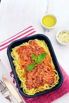 Spaghetti Pasta with Tomato Meat Sauce in Delivery Container