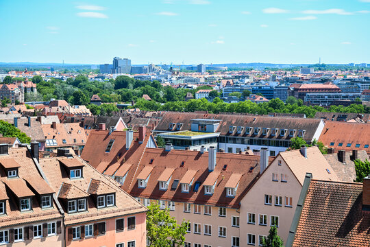 European city rooftops panorama with red tile roofs