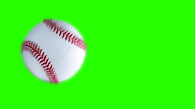 Spinning baseball flying on green screen background