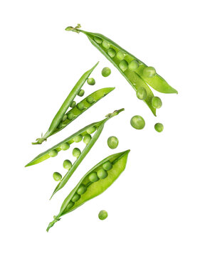 Open fresh green pea pods in the air isolated on white background