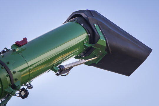 Metal pipe as part of combine harvester machine. Agricultural equipment