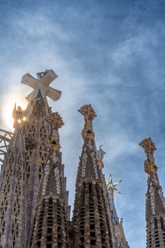 Barcelona, Spain. June 13, 2026, Sagrada Familia basilica towers soar into sky, Gaudis intricate modernist facade rising above BarcelonaUNESCO landmark and symbol of faith