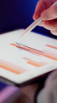 Drawing Rising Bar Chart Arrow Tablet Screen Close Up view investor conducting professional financial reporting, graphic tablet