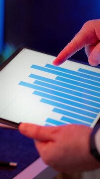 Bar Chart Tablet Screen Financial Data Analysis Businessman Hands Zooming Close Up executive interacting business growth statistics