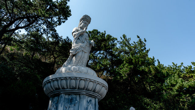 Stone statue of Gwanseeum-bosal at Haeundae Yonggungsa