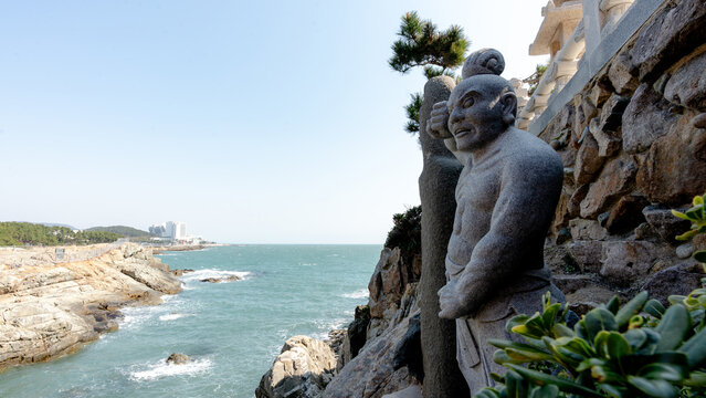 Statues and sea view at Haeundae Yonggungsa Temple