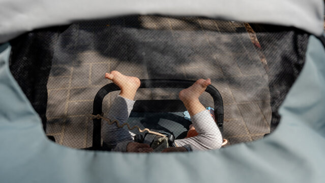 Baby in stroller enjoying a sunny day in Taichung