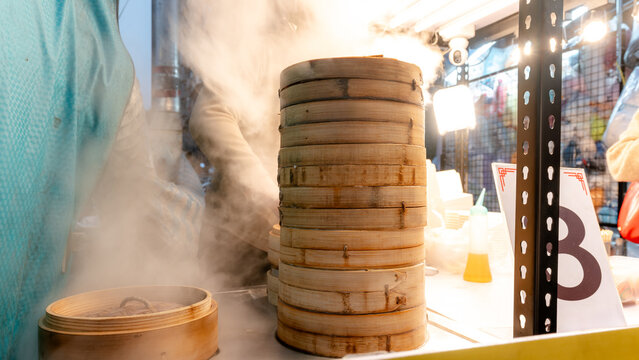 Steaming Shanghai dumplings at Fengjia Night Market