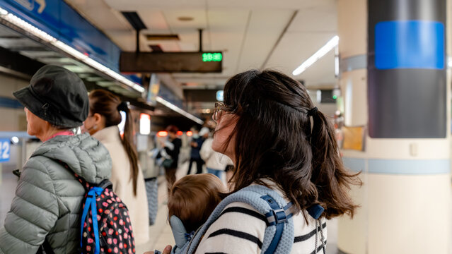 Commuters on a metro platform in Taipei, Taiwan