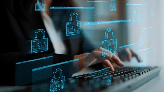 Close-Up of Person Typing on Keyboard with Digital Security Icons and Padlocks Illustrating Cybersecurity Concept in Modern Workspace. Entropy.
