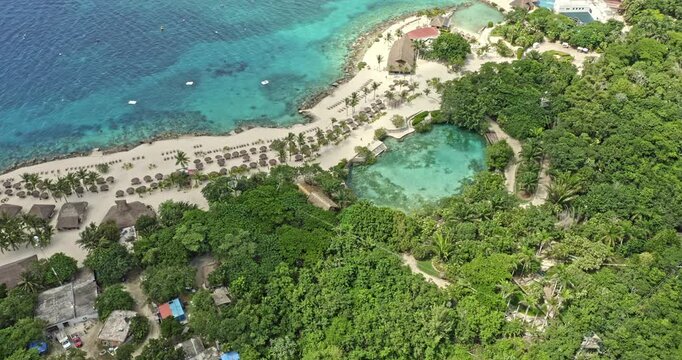 Cozumel Mexico Aerial v16 cinematic birds eye view overlooking at chankanaab beach adventure park, tilt up shot along the coastal reveals beautiful seascape and landscape - September 2020