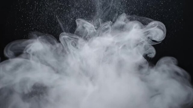 Dynamic white powder scattering and clouding on a dark background