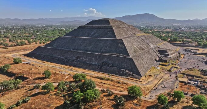 Teotihuacan Mexico Aerial v2 spectacular drone fly around the historical landmark pyramid of the sun capturing the details of the building facade - Shot with Mavic 3 Cine - December 2021