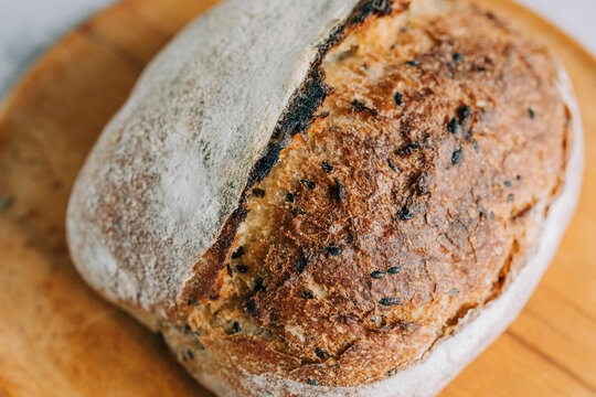 Rustic artisan bread loaf with organic ingredients, close-up