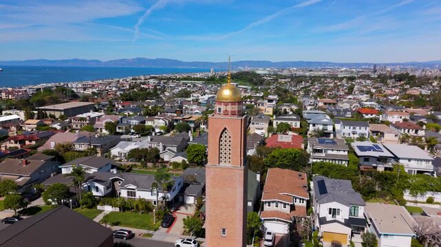 Aerial Around American Martyrs Catholic Church Bell Tower in Manhattan Beach California, March 10, 2026
