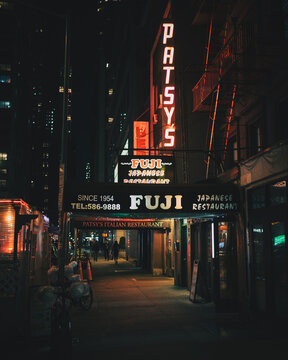 Patsys Italian Restaurant vintage neon sign at night, Manhattan, New York City