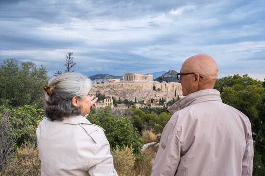 Tourists viewing the Acropolis and Parthenon in Athens