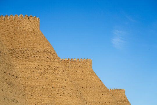 Ancient Ark fortress walls in Bukhara, Uzbekistan at dawn
