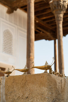 Historic Ark of Bukhara, Uzbekistan with brass lamps