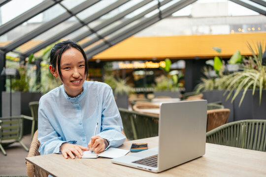 Businesswoman working remotely in casual setting