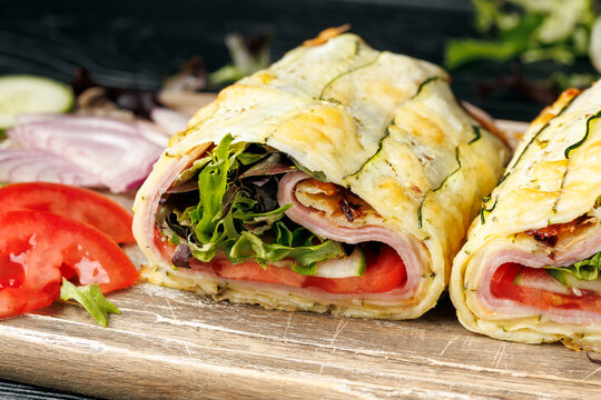 Crispy Zucchini Cheddar Wrap with Ham and Fresh Vegetables