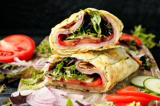 Crispy Zucchini Cheddar Wrap with Ham and Fresh Vegetables