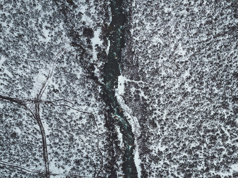 Drone view of snowy mountain river in Mendoza, Argentina