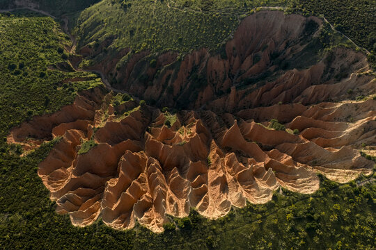 Magical spring light over rugged badlands landscape