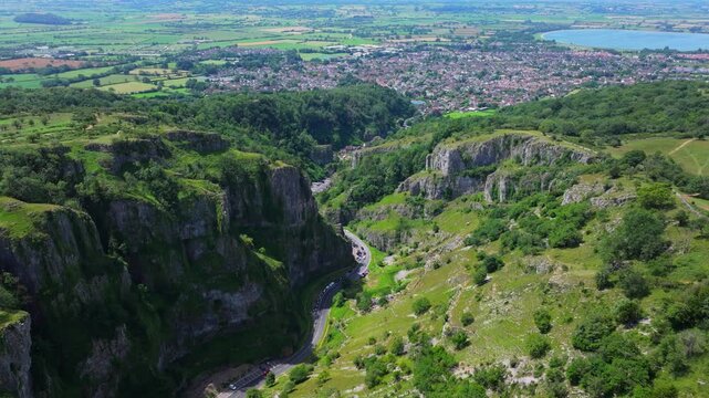 Aerial shot flying down Cheddar Gorge in Somerset, UK
