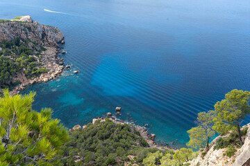 Fototapeta premium Aerial view of turquoise bay and rocky coastline in the Mediterranean Sea