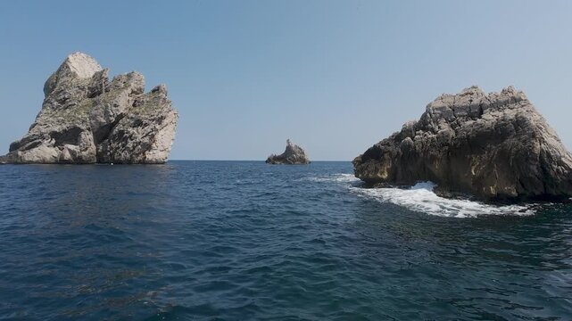 Navigating between rocky sea stacks in the mediterranean