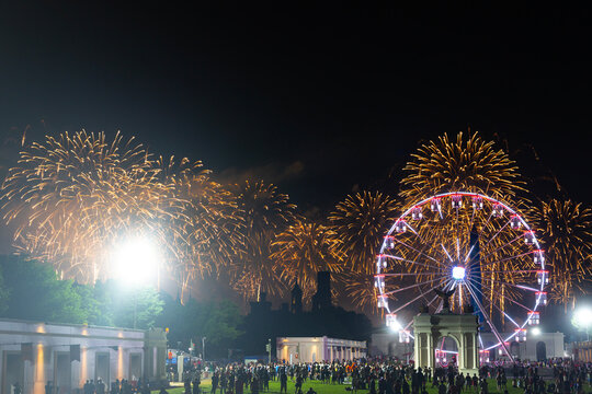Fireworks over Washington DC night. Golden fireworks mark America 250. National fireworks festival near monument. Fireworks honor American freedom celebration. Monument firework.