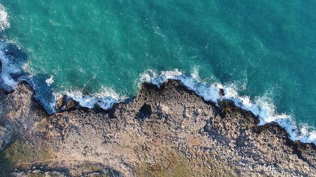 Top down aerial view of rocky Bari coast