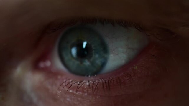 Macro close up cinematic off focus bokeh video, abstract artistic, emotion, human body, vivid men blue eye's 