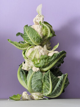 Creative cauliflower set design with purple backdrop