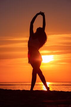 Golden hour woman dancing