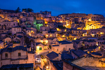 Naklejka premium Beautiful night view of Matera Italy with historic ancient architecture 