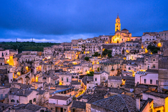 Beautiful night view of Matera Italy with historic ancient architecture 