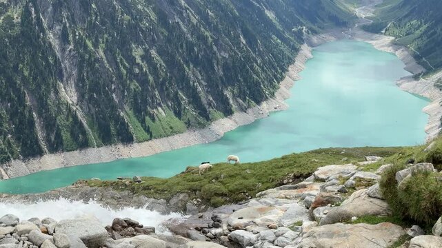 Hiking to Olpererhuette in Austria with views of the lake and mountains along the trail