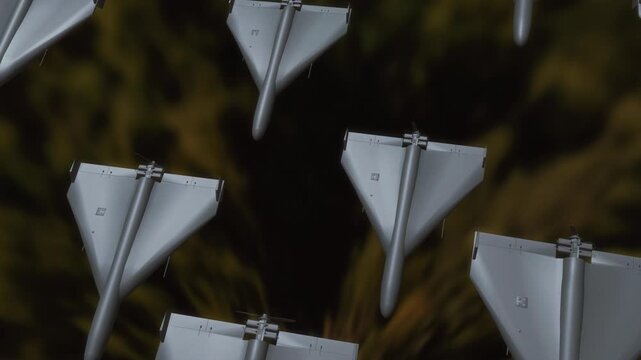 High angle view of multiple tactical delta wing drones cruising through the air above a dark forest canopy in a detailed 3D rendering