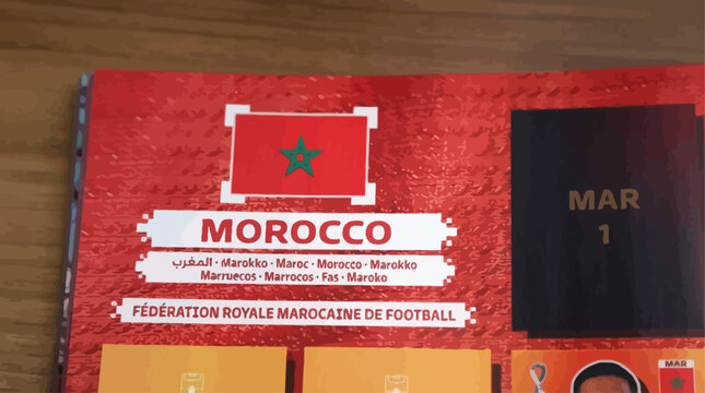 Moroccan football calendar March on wooden table with colorful cards