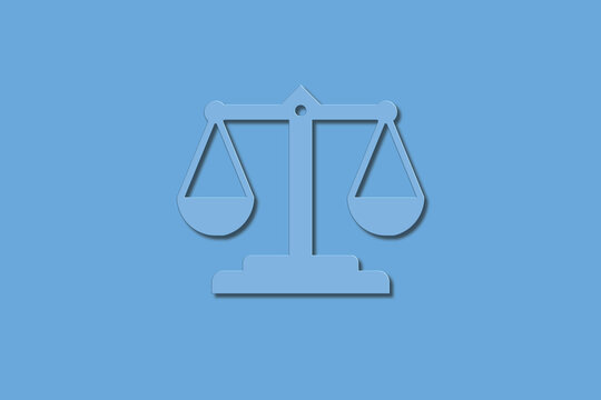 Balance scales symbol on a blue background showing a legal theme with no text or additional elements in view